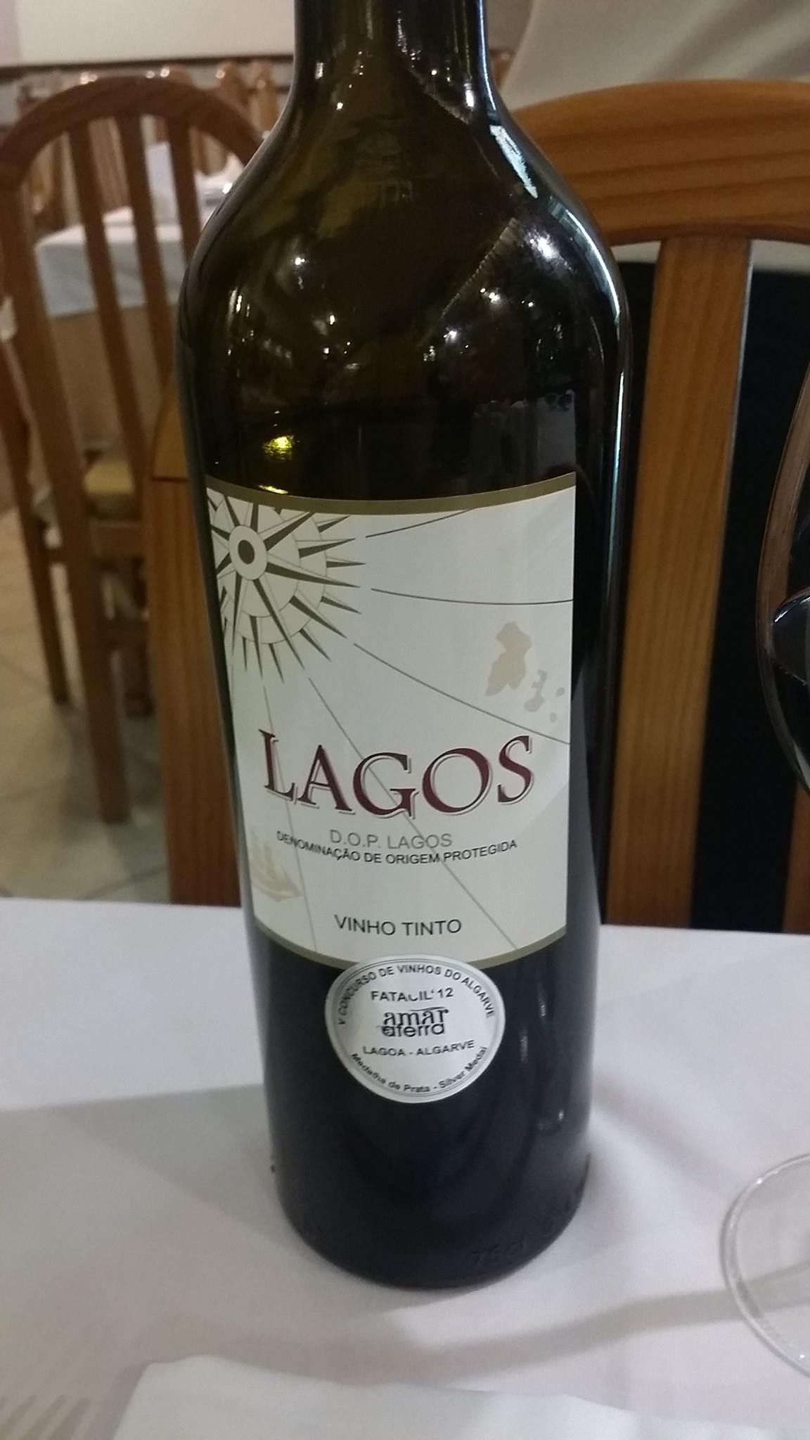 Portuguese wine 12 dollars at a restaurant Lagos