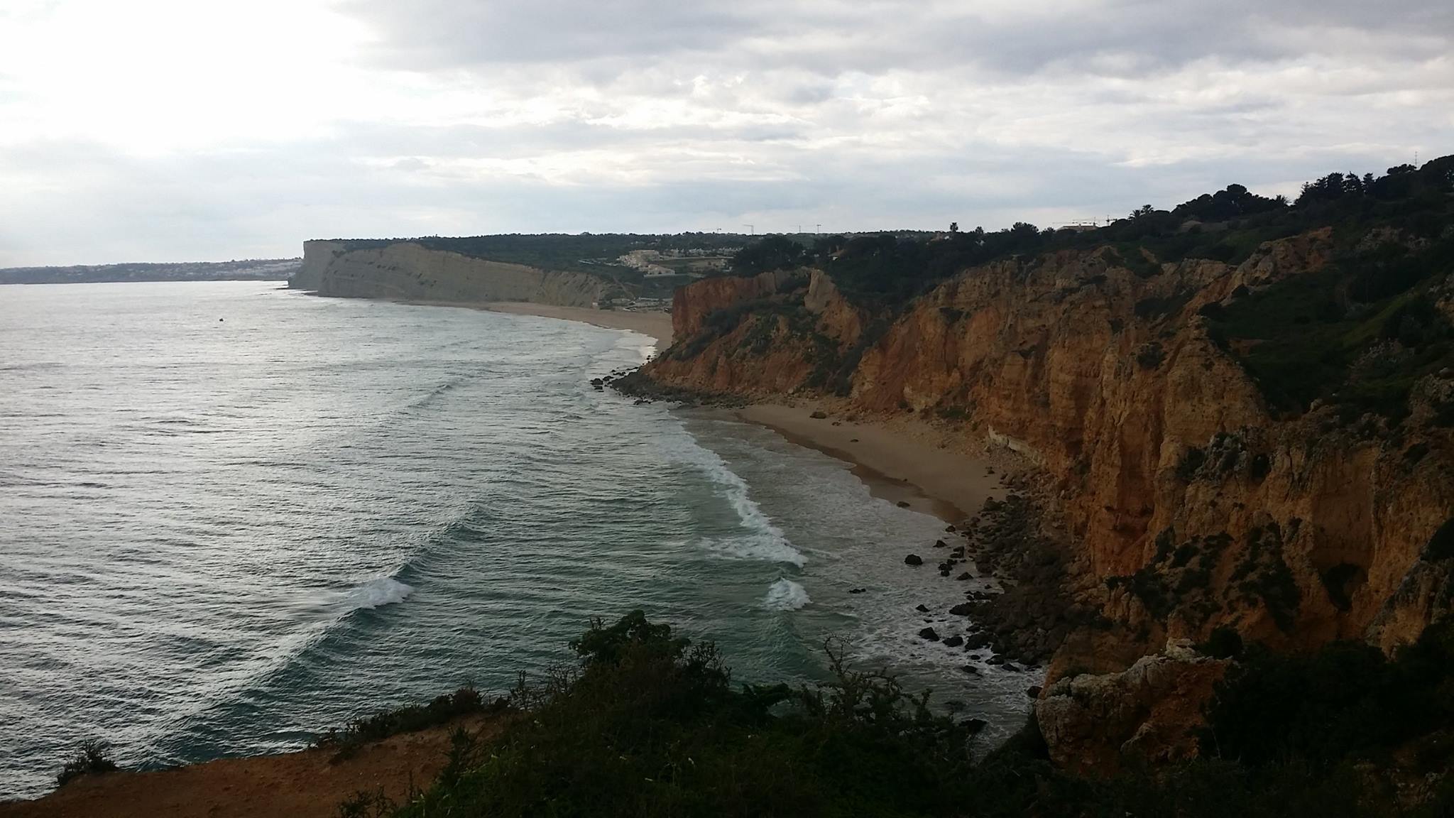 Transition of cliffs from limestone to granite Lagos Portugal