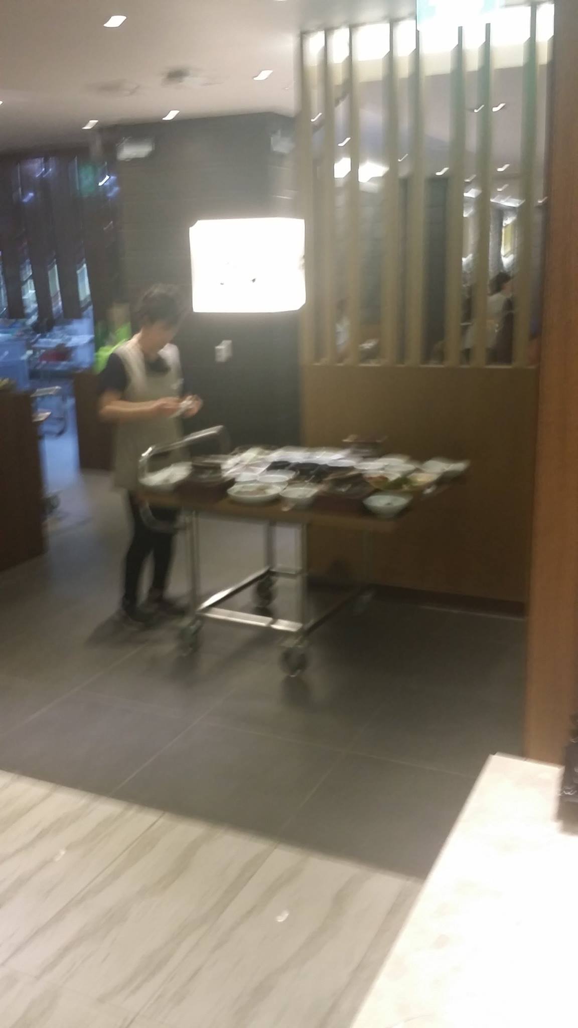 Tabletop comes out pre-loaded entire tabletop slides onto table Korea Seoul restaurant