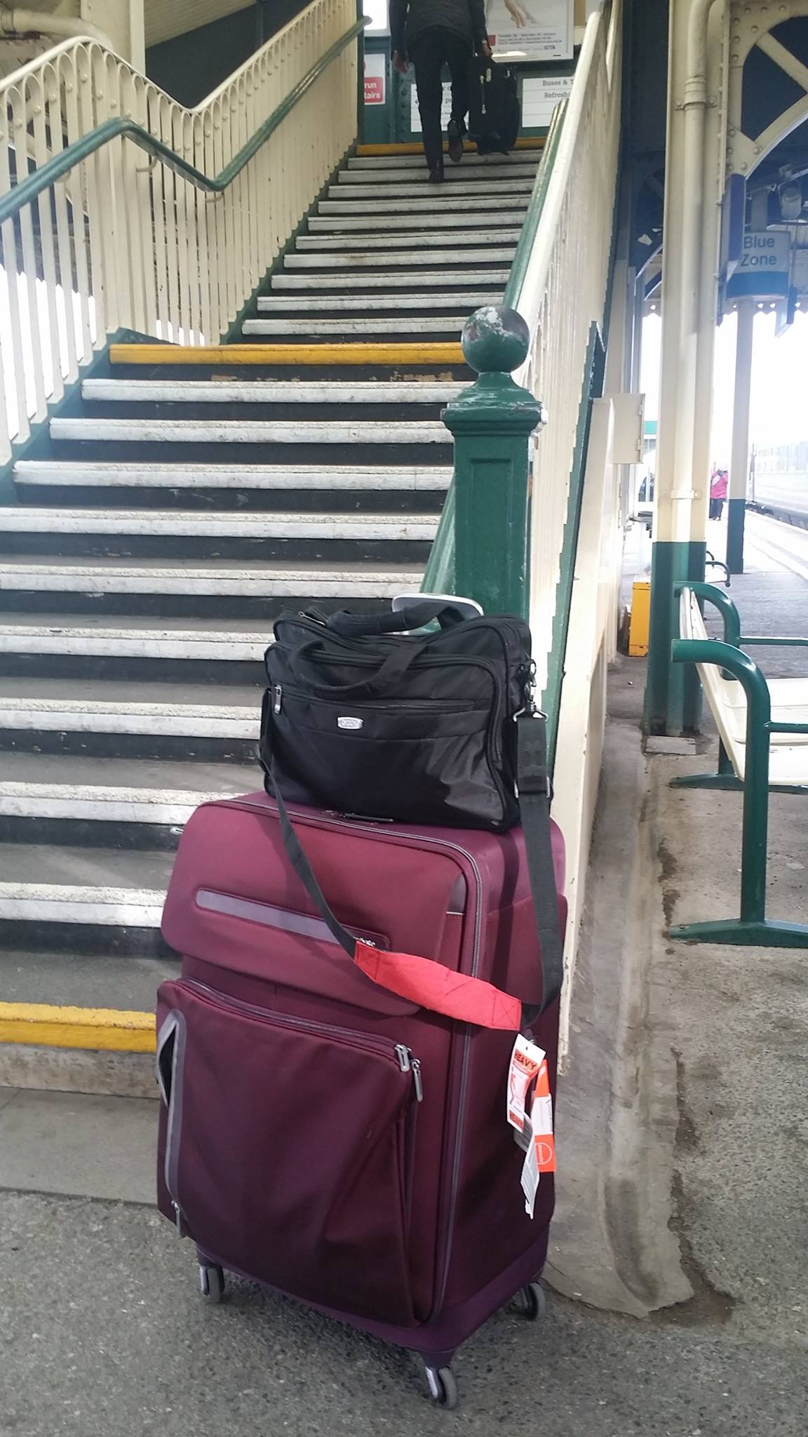 Train station steps UK one arm luggage Chippenham