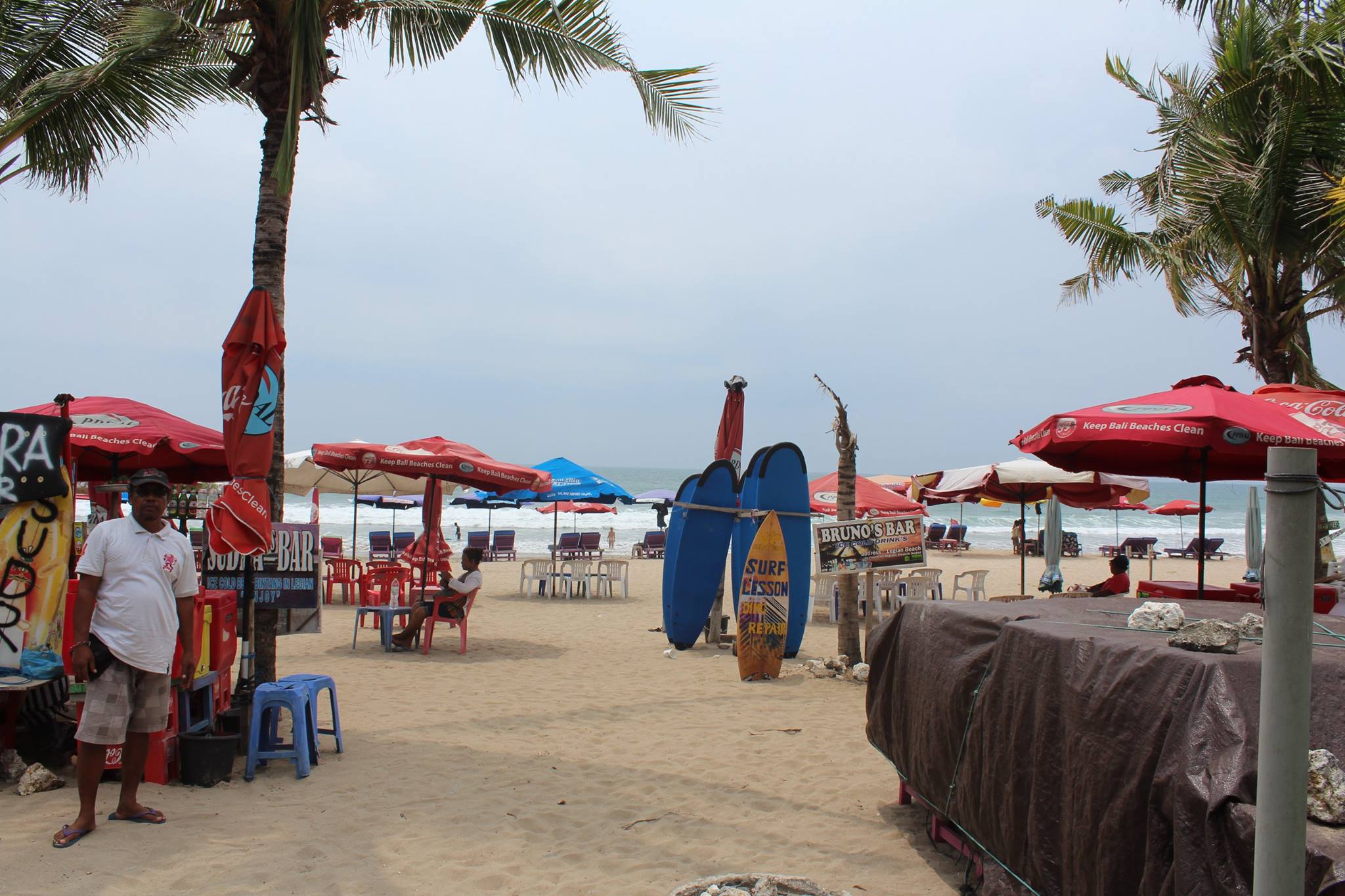 Beach in front of hotel Legian Bali Bintang beer 1.60