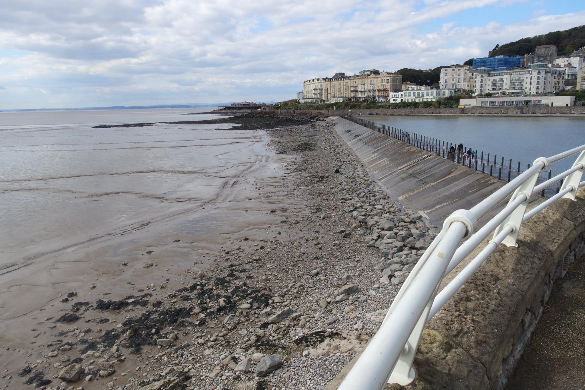Low tide pool traps marine life at high tide ocean over wall Weston