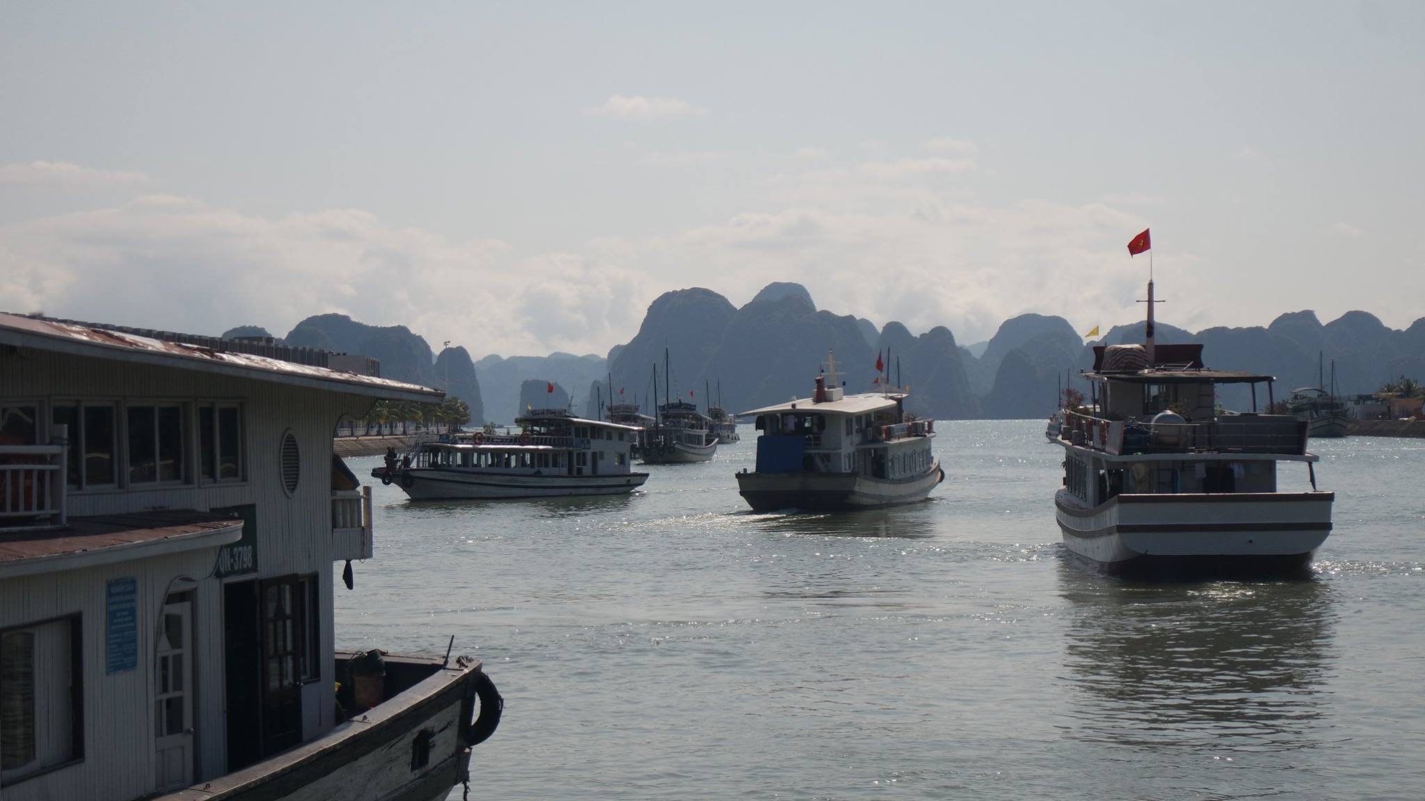 Many tours heading to Ha Long Bay Vietnam boats